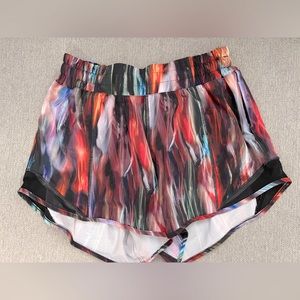 Lululemon running shorts with hidden zipper pockets, size 4 Tall